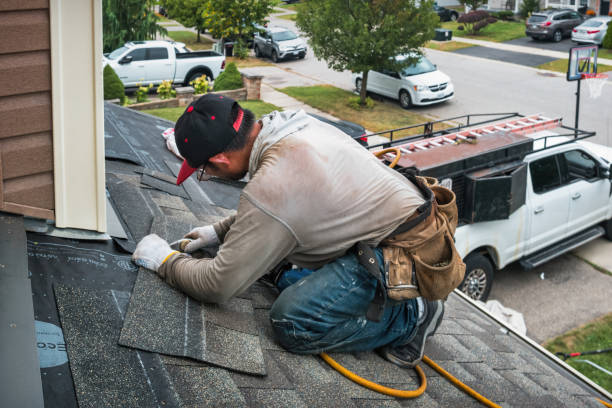 Professional Emergency Roof Repair technician working in Lane, KS